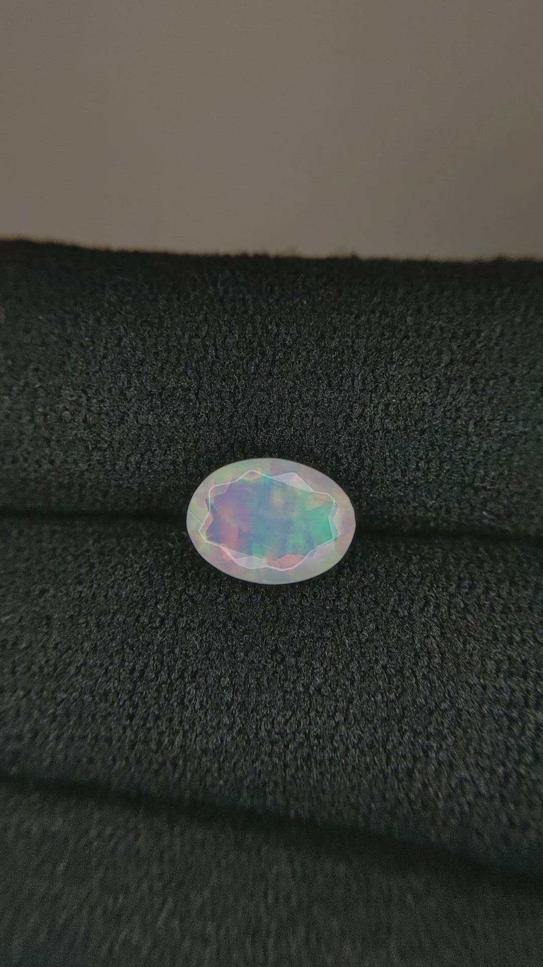 0.85 Ct. Multi Color White Opal from Ethiopia Size Video