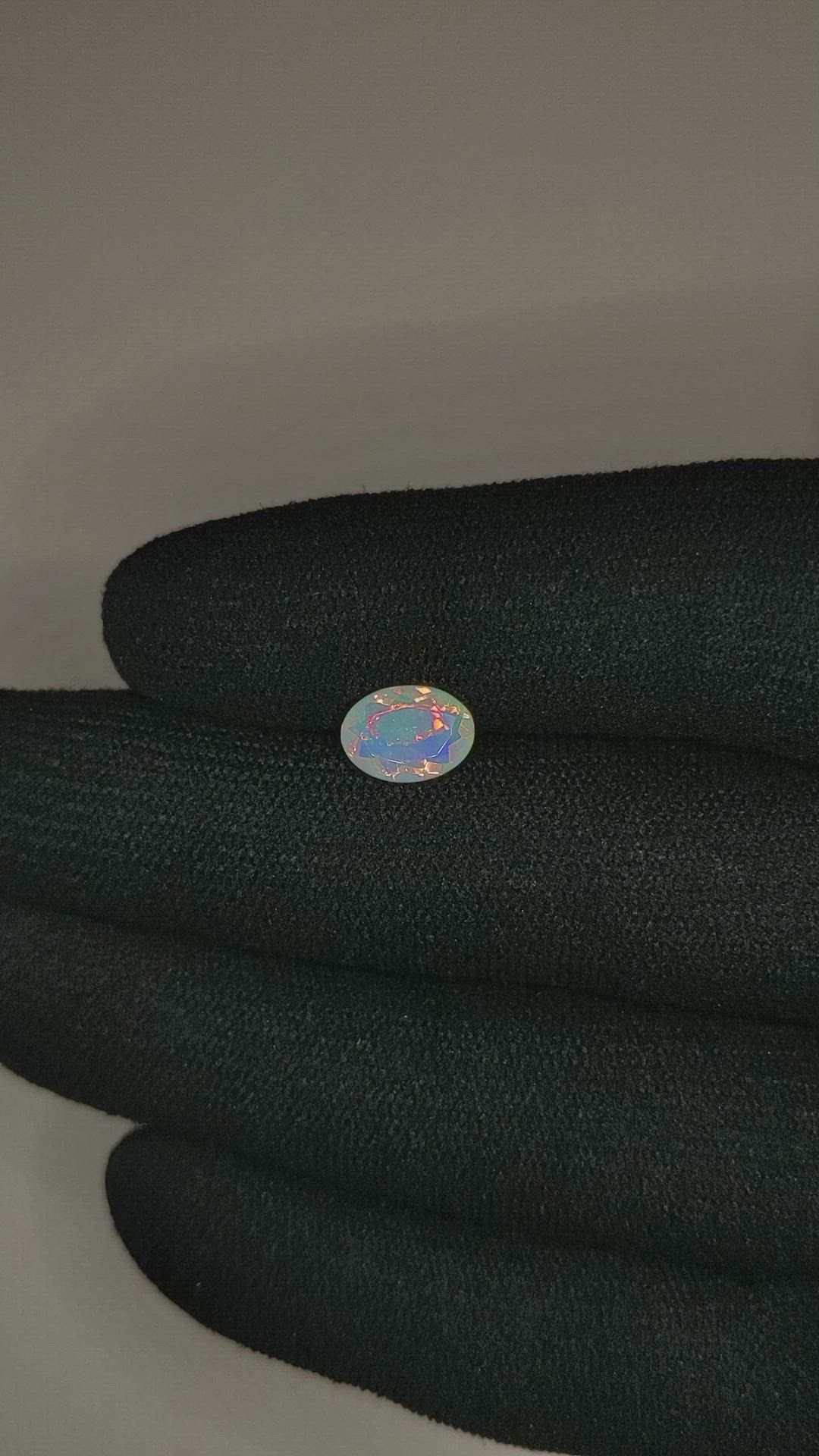 0.91 Ct. Multi Color White Opal from Ethiopia Size Video