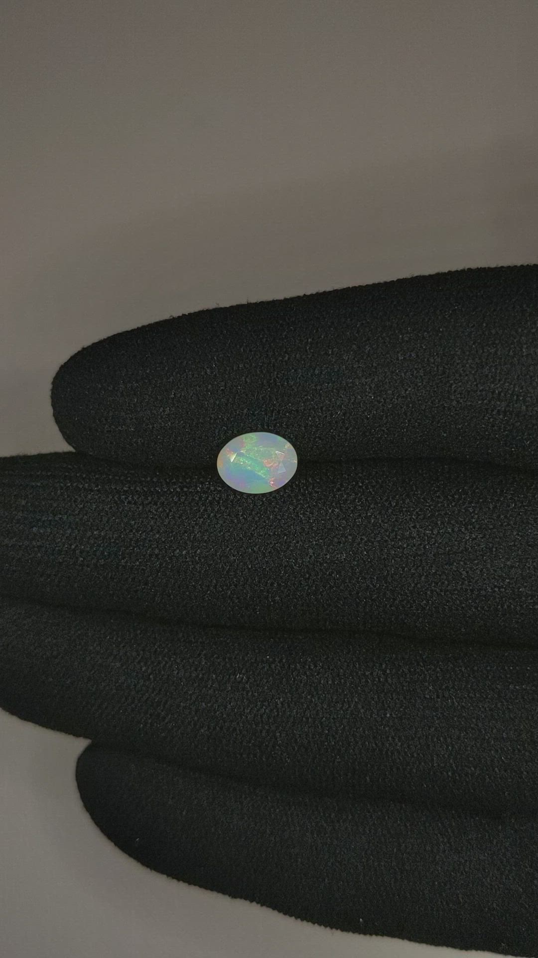 0.80 Ct. Multi Color White Opal from Australia Size Video
