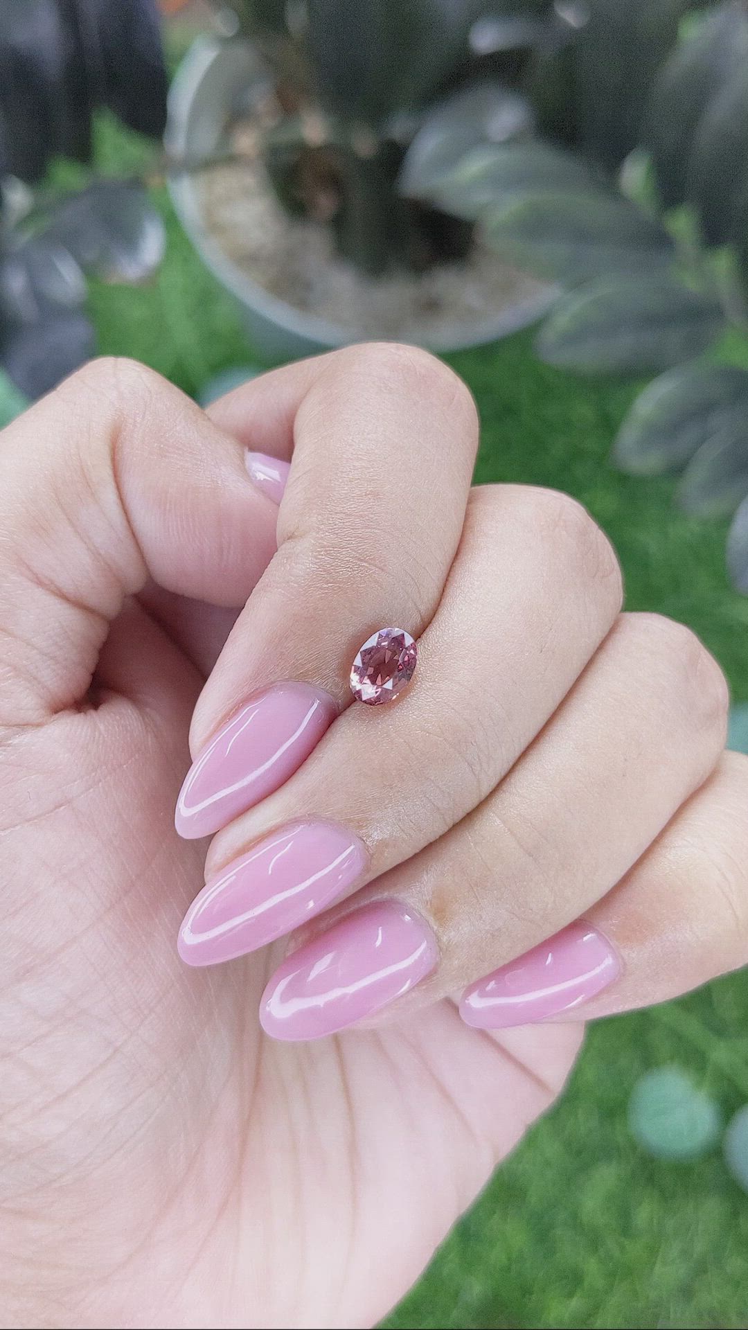 1.03 Ct. Orangish Pink Malaya Garnet from Tanzania Size Video