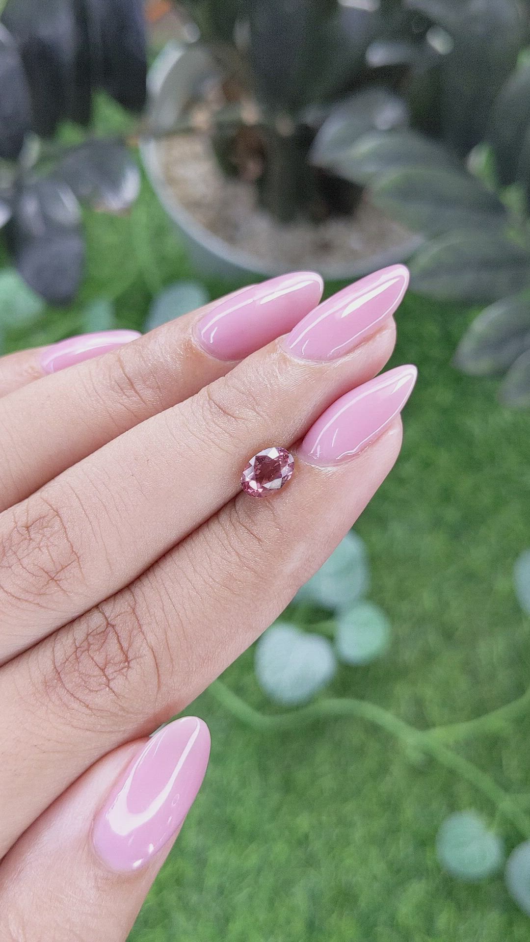 1.03 Ct. Orangish Pink Malaya Garnet from Tanzania Size Video