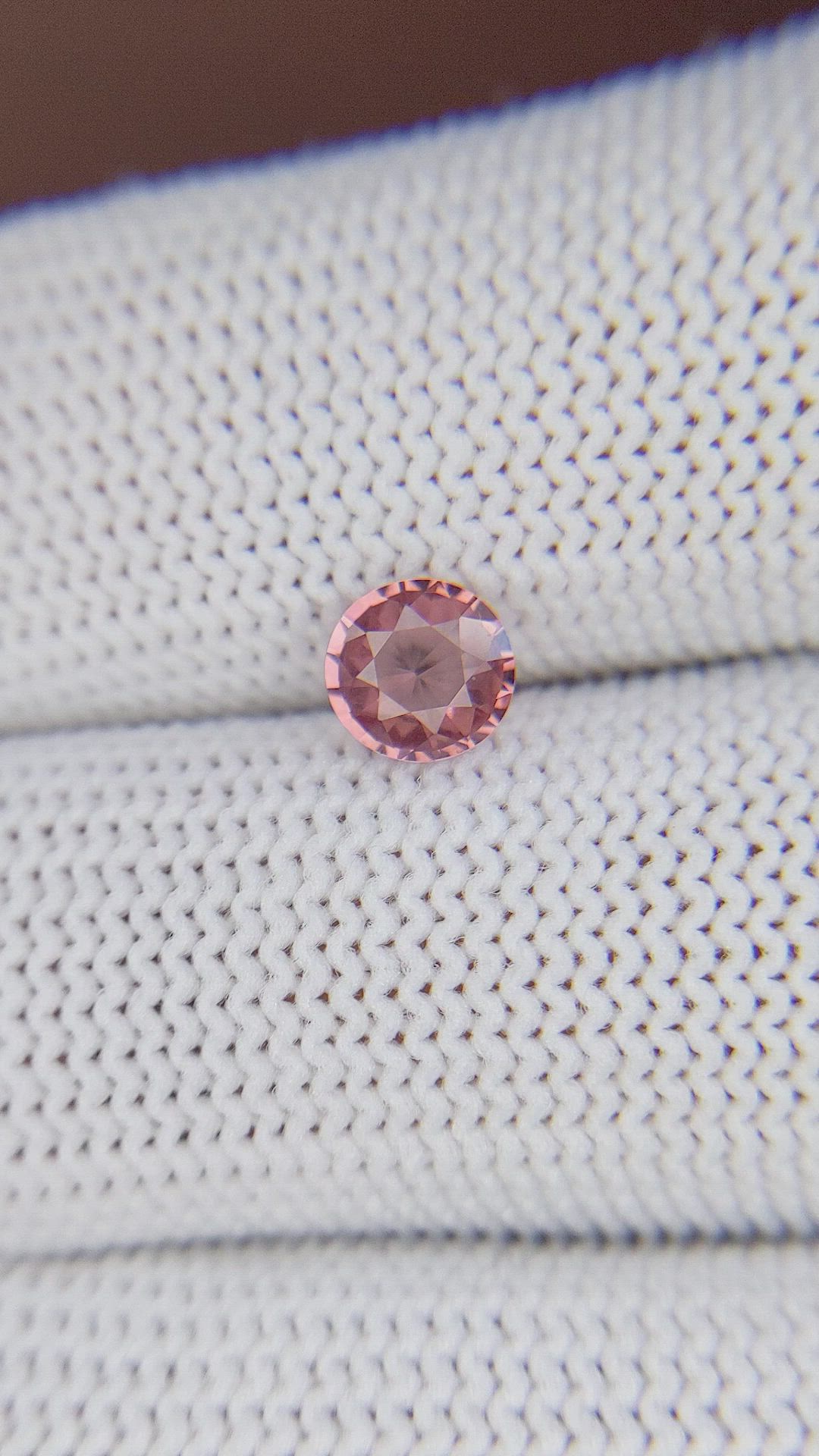 0.73 Ct. Orangish Pink Malaya Garnet from Tanzania Size Video