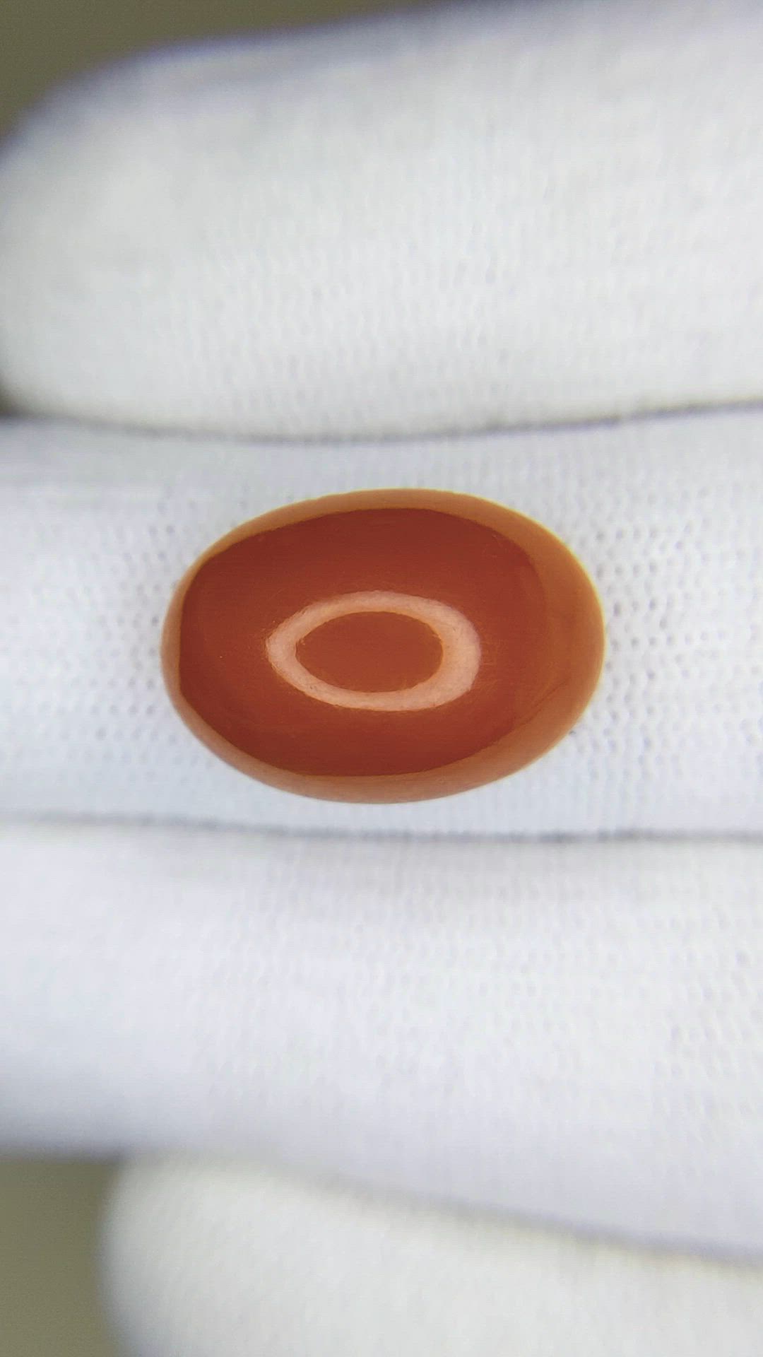 10.66 Ct. Salmon (Orange) Cabochon Coral from Mexico Size Video