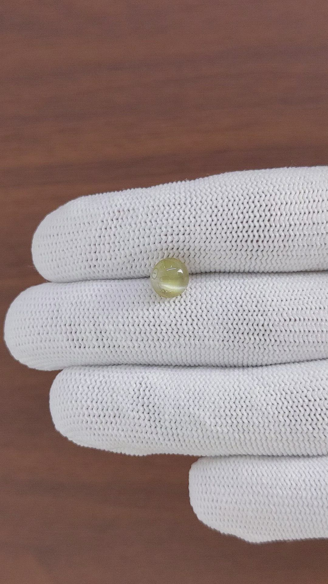 2.88 Ct. Greenish Yellow Cabochon Chrysoberyl Size Video