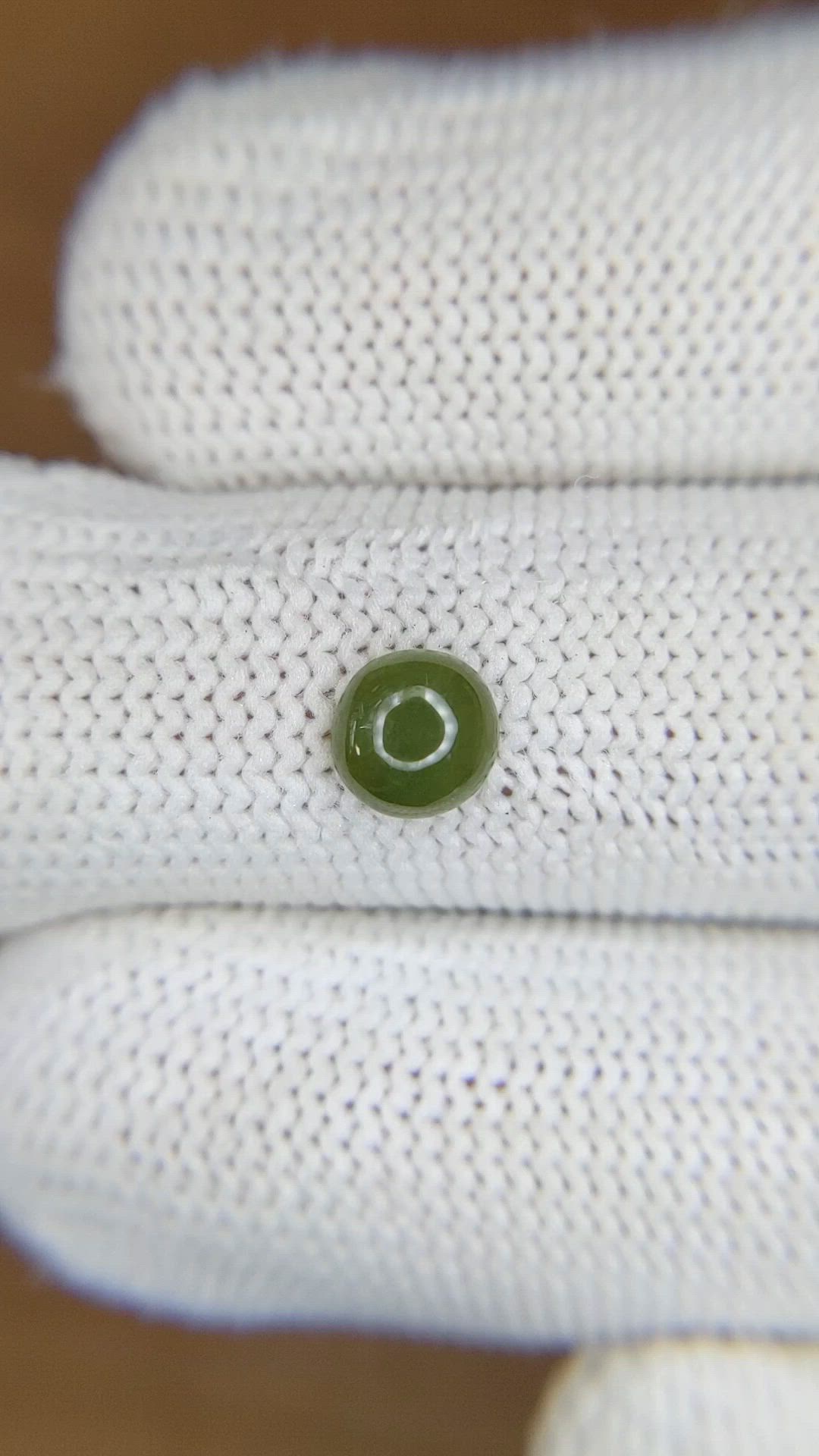 0.80 Ct. Yellowish Green Cabochon Jade from Burma (Myanmar) Size Video