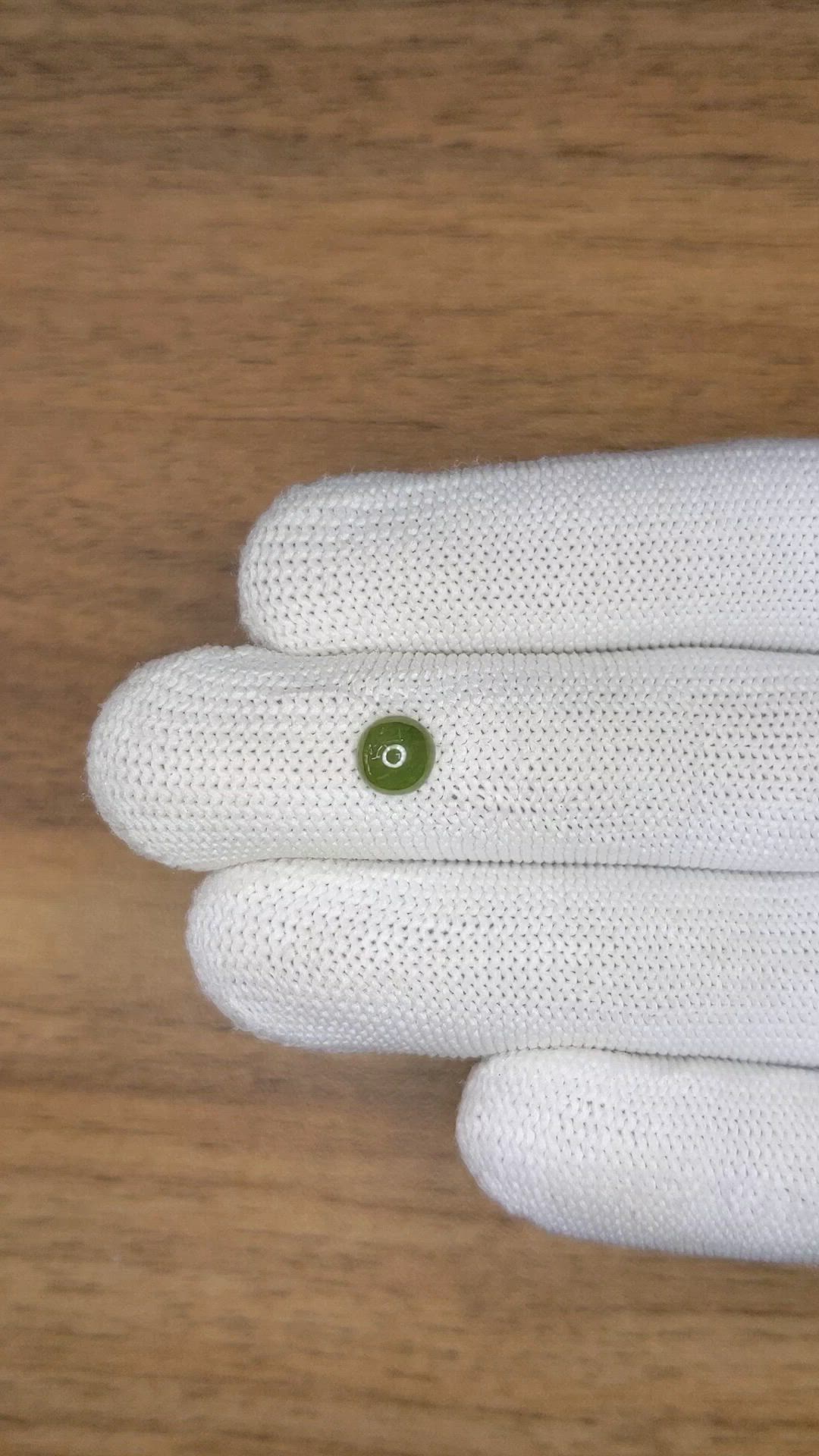 0.80 Ct. Yellowish Green Cabochon Jade from Burma (Myanmar) Size Video