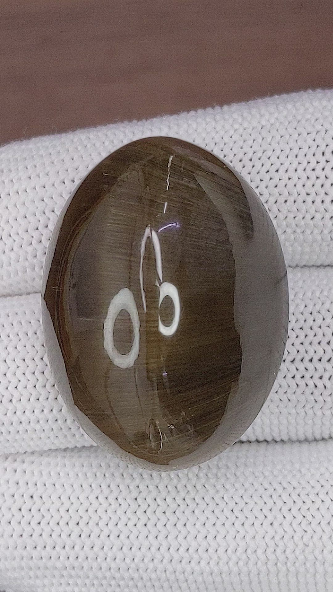 100.43 Ct. Brown Cabochon Rutilated Quartz from Ceylon (Sri Lanka) Size Video
