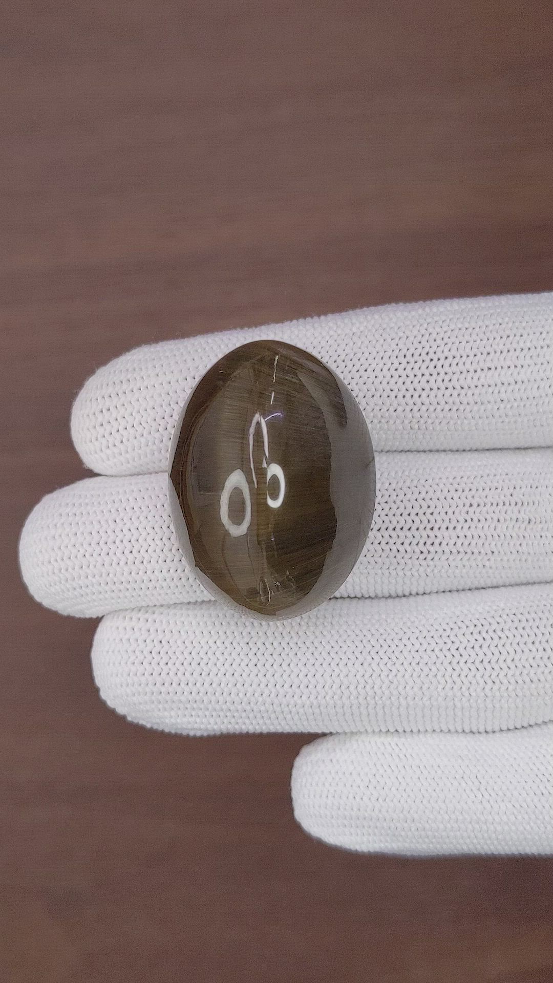 100.43 Ct. Brown Cabochon Rutilated Quartz from Ceylon (Sri Lanka) Size Video