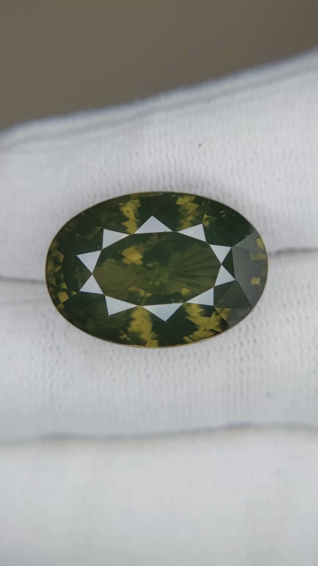 31.73 Ct. Yellowish Green Zircon from Brazil Size Video