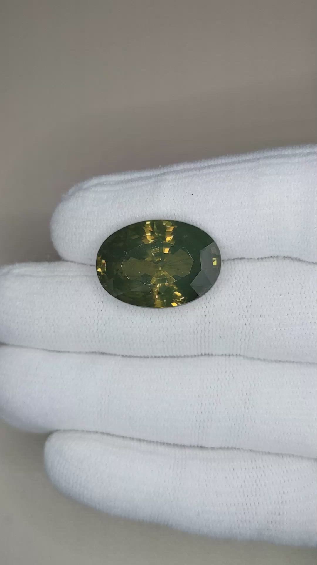 31.73 Ct. Yellowish Green Zircon from Brazil Size Video