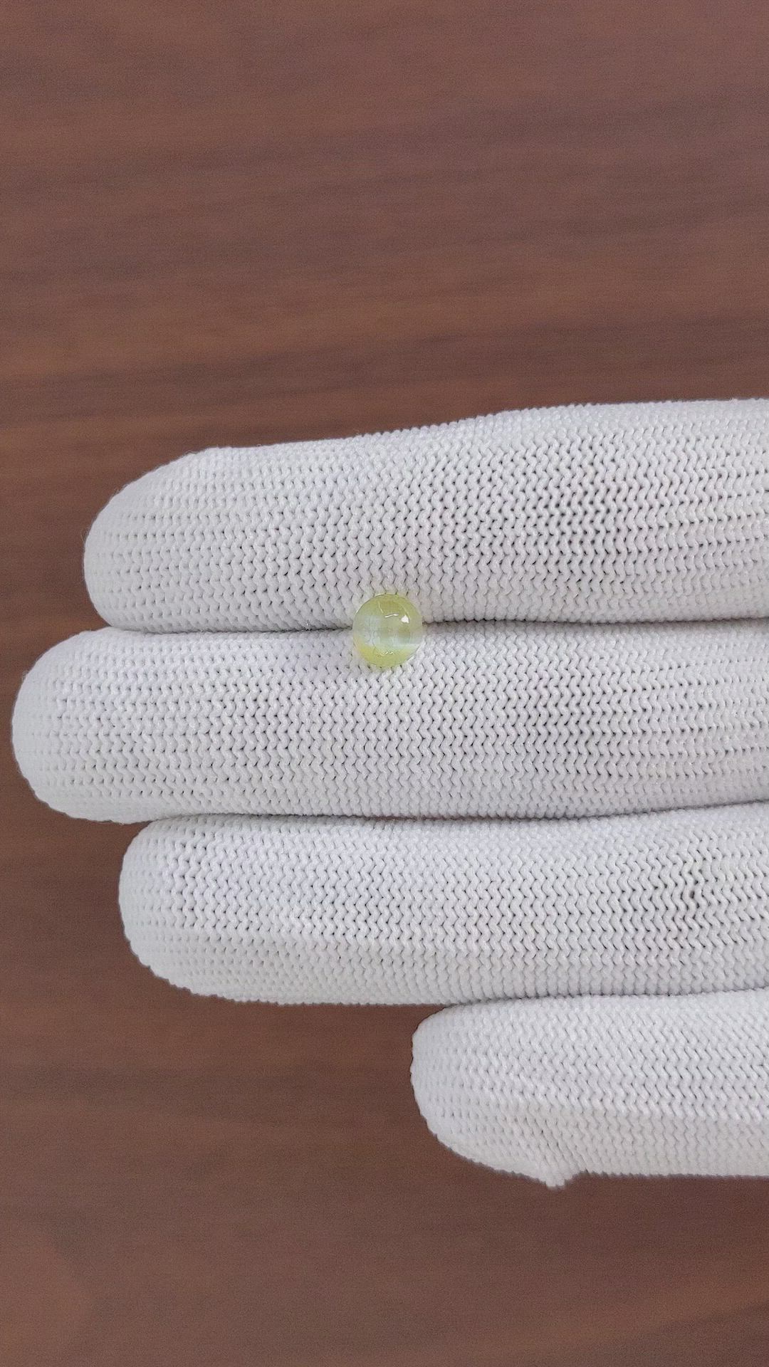 1.55 Ct. Yellowish Green Cabochon Chrysoberyl from Tanzania Size Video