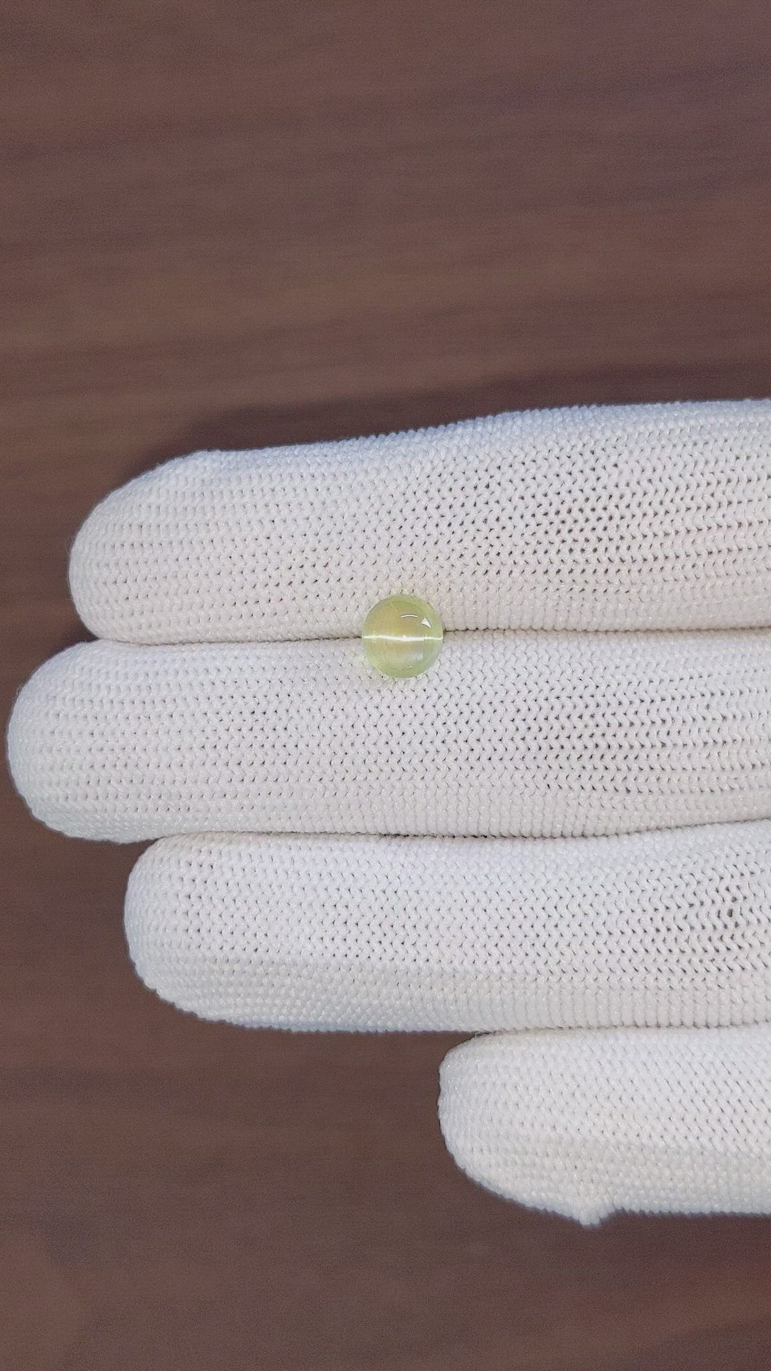 2.06 Ct. Yellowish Green Cabochon Chrysoberyl from Tanzania Size Video