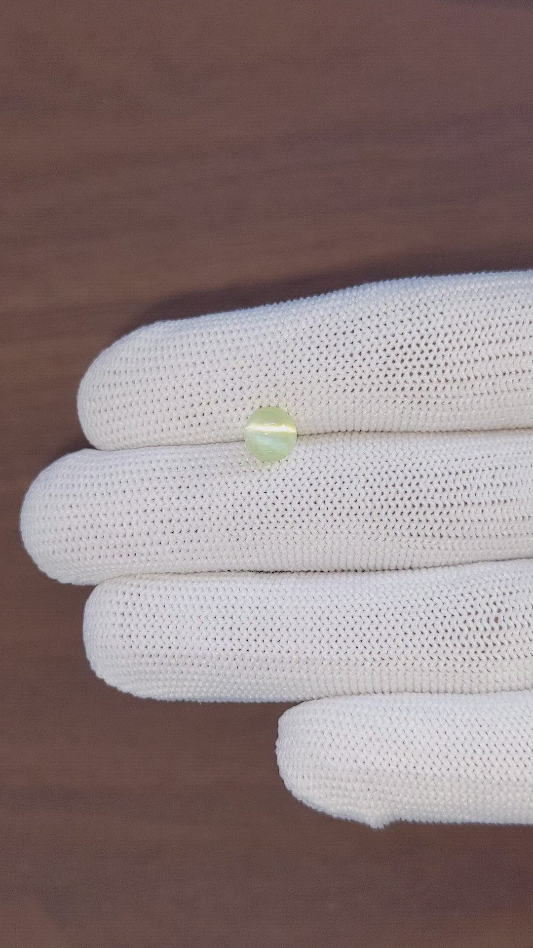 2.27 Ct. Yellowish Green Cabochon Chrysoberyl from Tanzania Size Video