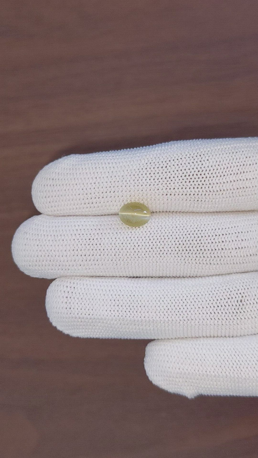 2.37 Ct. Greenish Brown Cabochon Chrysoberyl from Tanzania Size Video