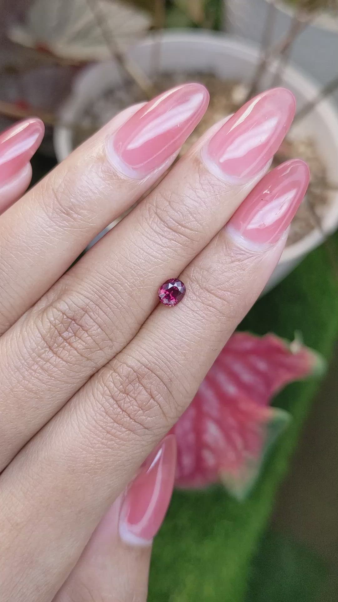 0.61 Ct. Pinkish Red Garnet from Ceylon (Sri Lanka) Size Video
