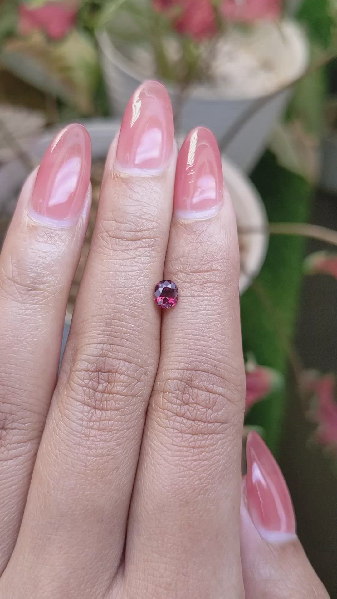 0.61 Ct. Pinkish Red Garnet from Ceylon (Sri Lanka) Size Video