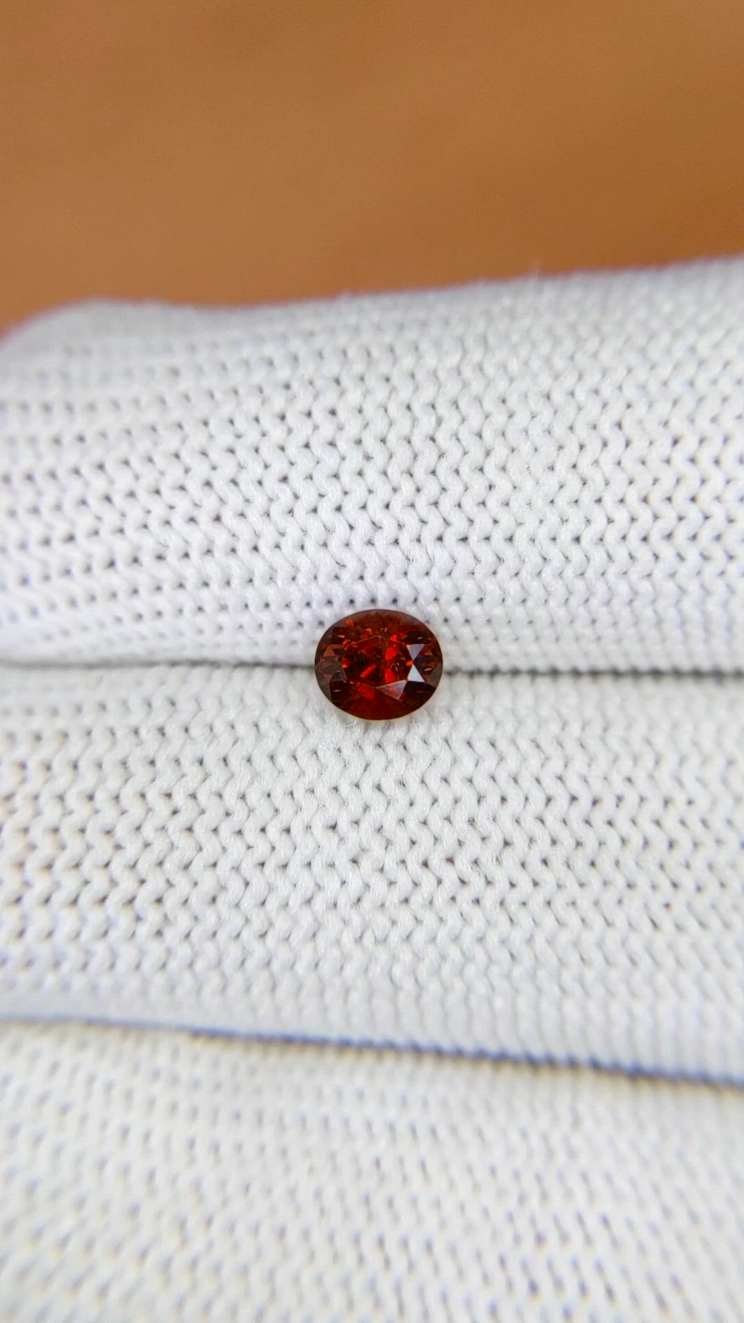 0.77 Ct. Orangish Red Garnet from Ceylon (Sri Lanka) Size Video