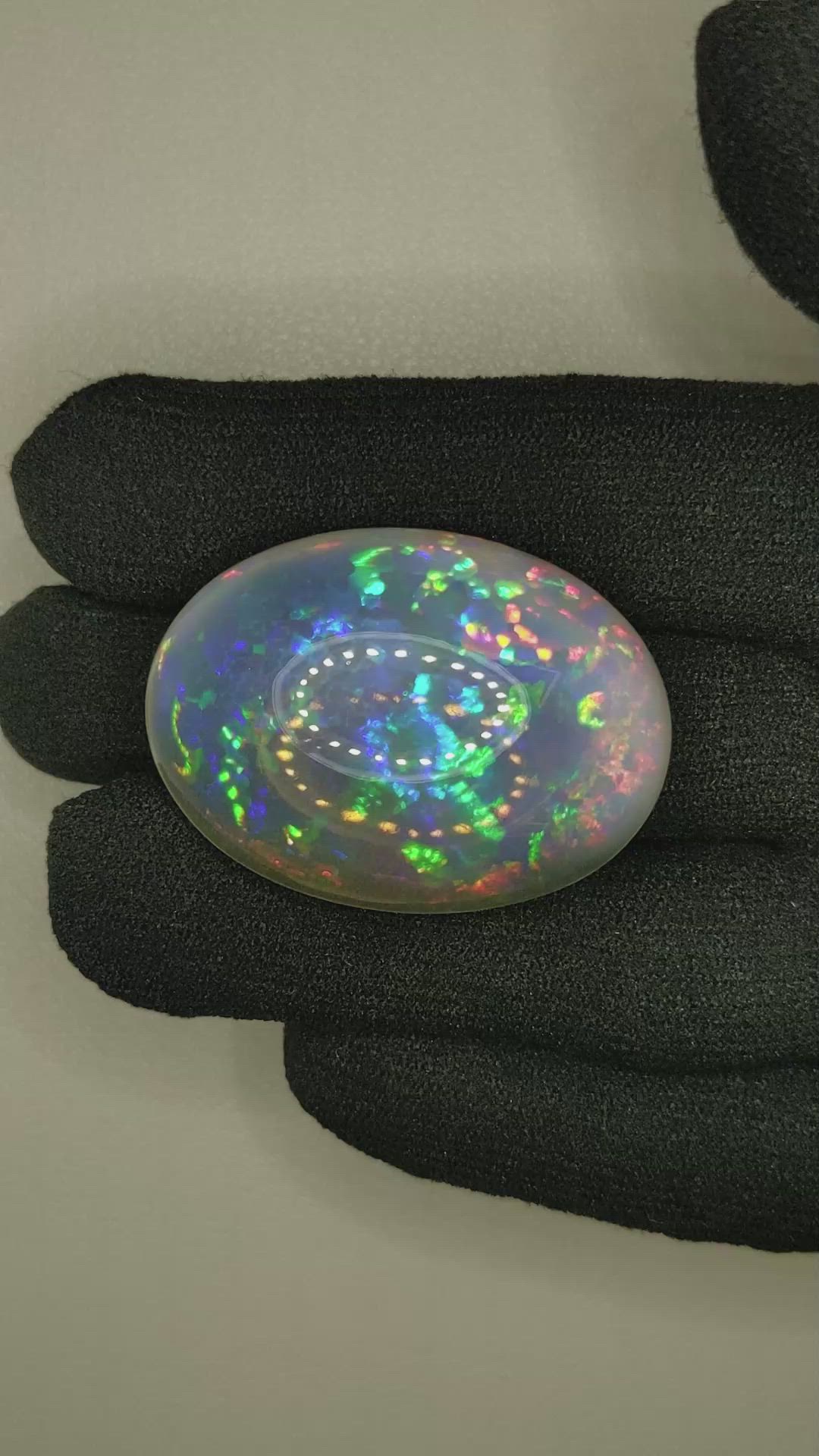 58.74 Ct. Multi Color Cabochon White Opal from Ethiopia Size Video