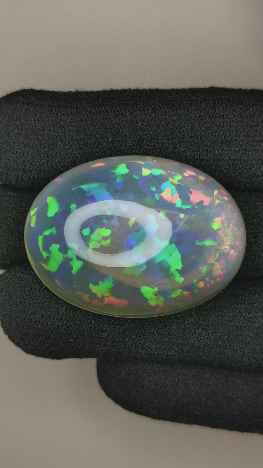 58.74 Ct. Multi Color Cabochon White Opal from Ethiopia Size Video