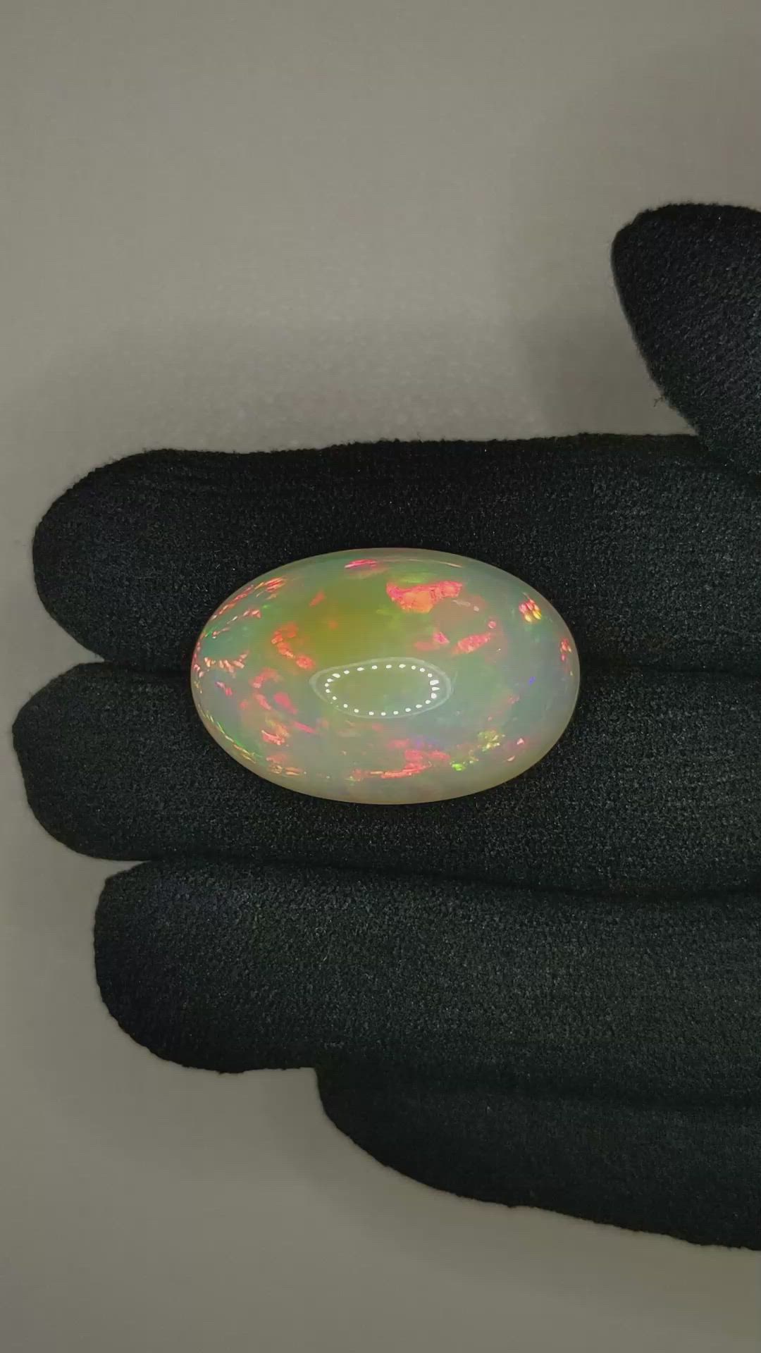 21.80 Ct. Multi Color Cabochon White Opal from Ethiopia Size Video
