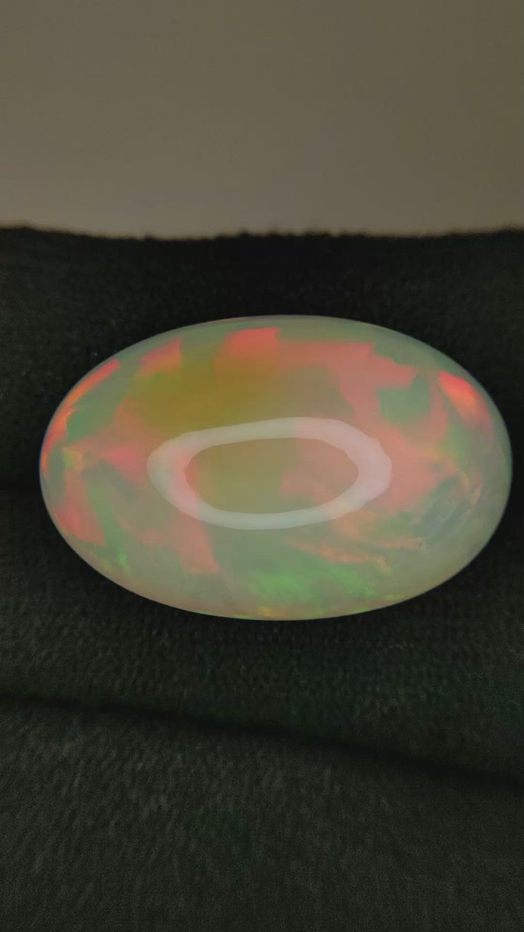 21.80 Ct. Multi Color Cabochon White Opal from Ethiopia Size Video