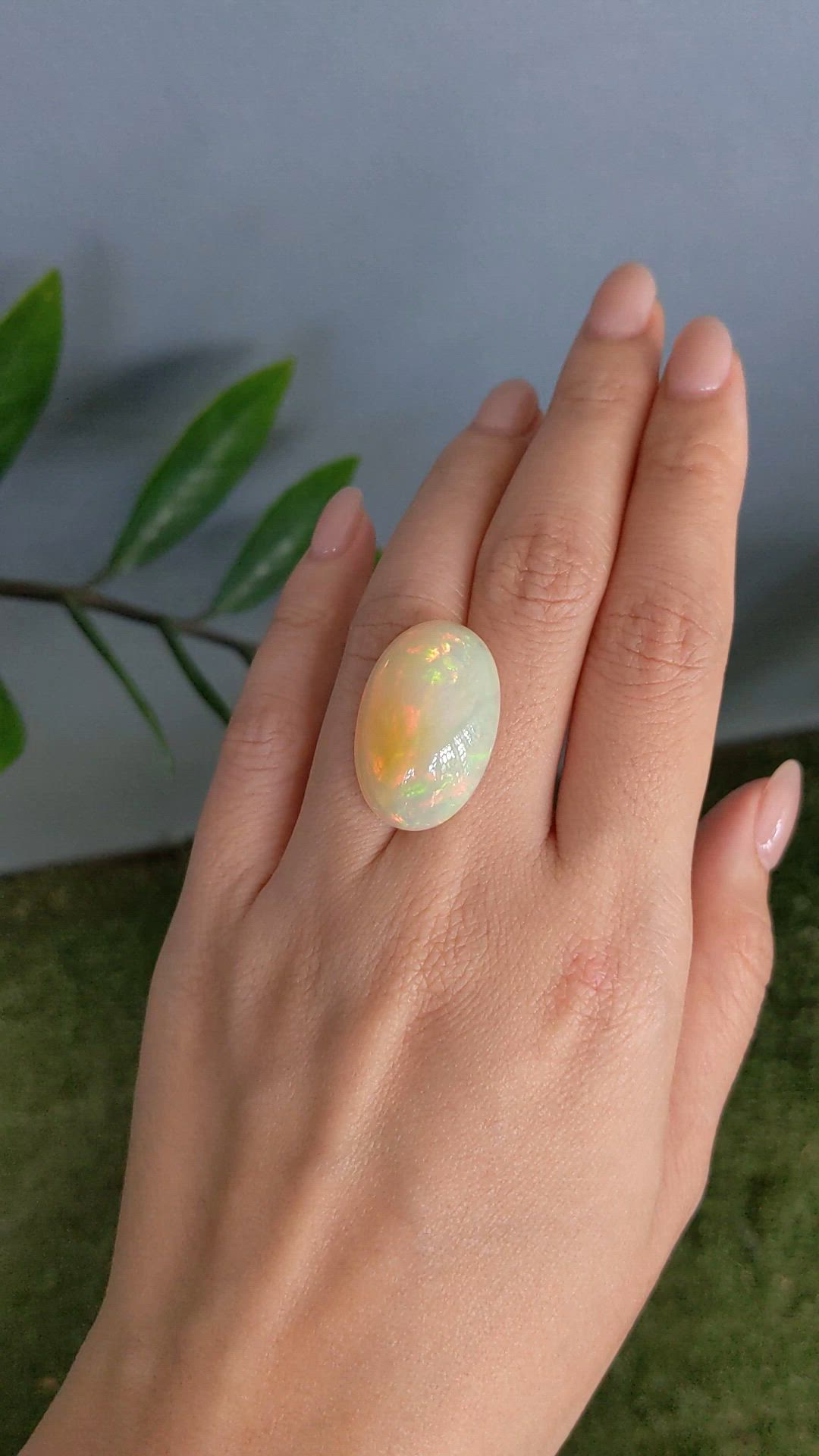 21.80 Ct. Multi Color Cabochon White Opal from Ethiopia Size Video