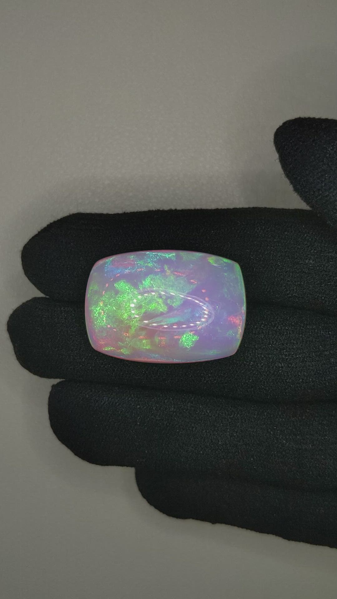24.95 Ct. Multi Color White Opal from Ethiopia Size Video