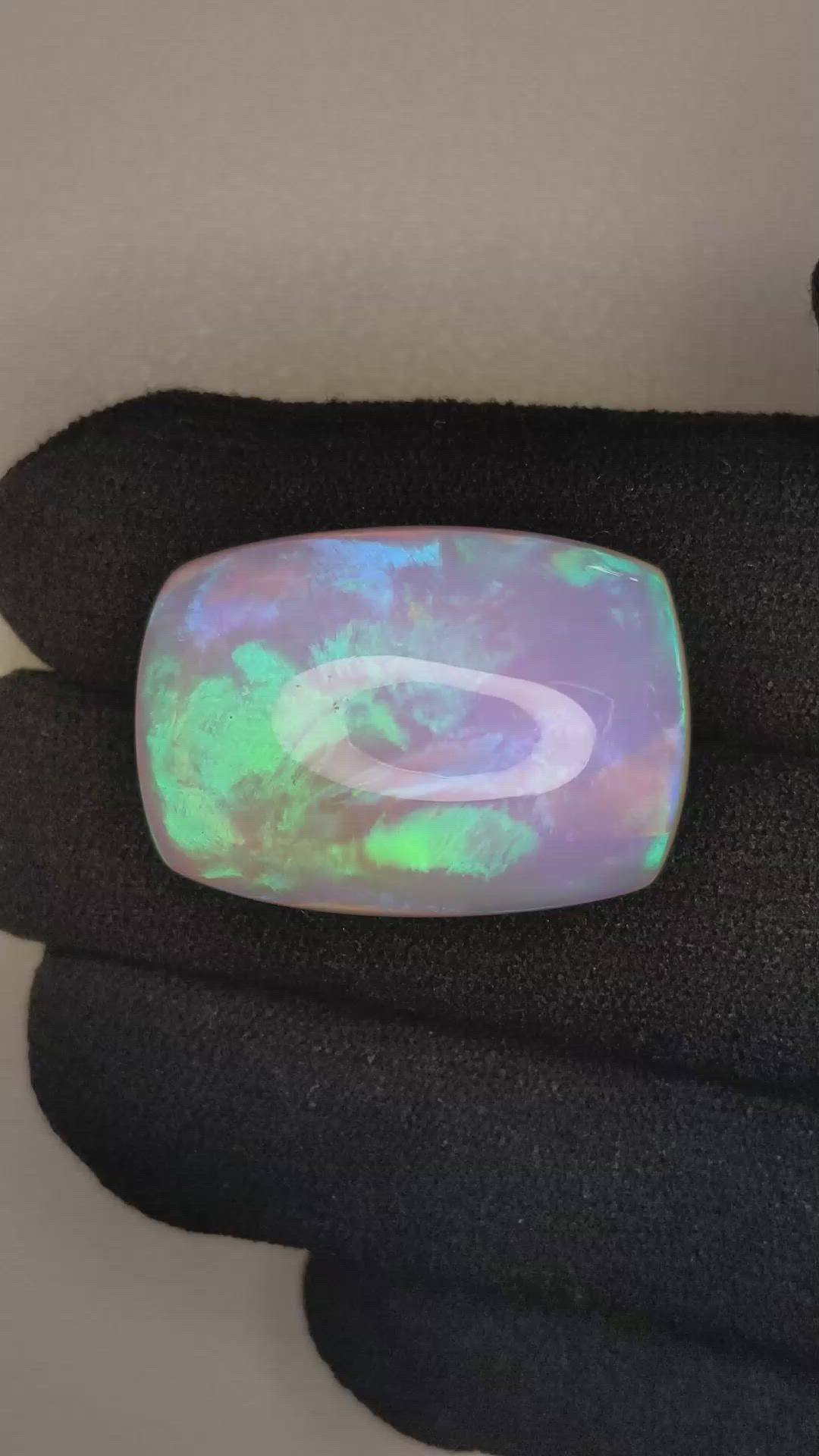 24.95 Ct. Multi Color White Opal from Ethiopia Size Video