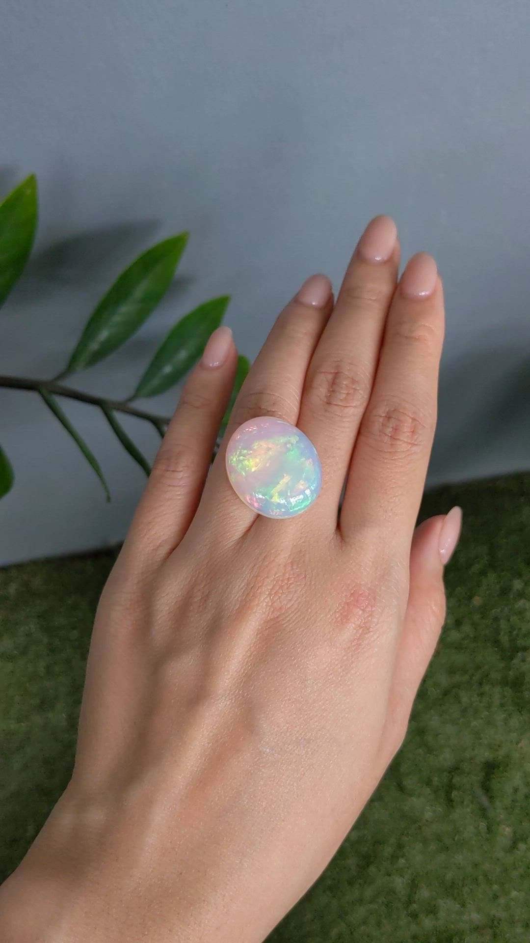 24.81 Ct. Multi Color Cabochon White Opal from Ethiopia Size Video