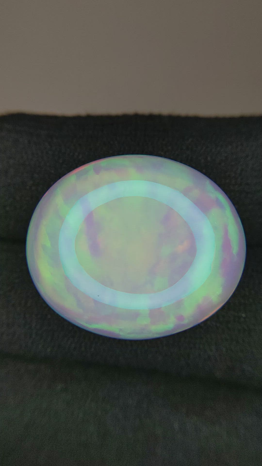 24.81 Ct. Multi Color Cabochon White Opal from Ethiopia Size Video