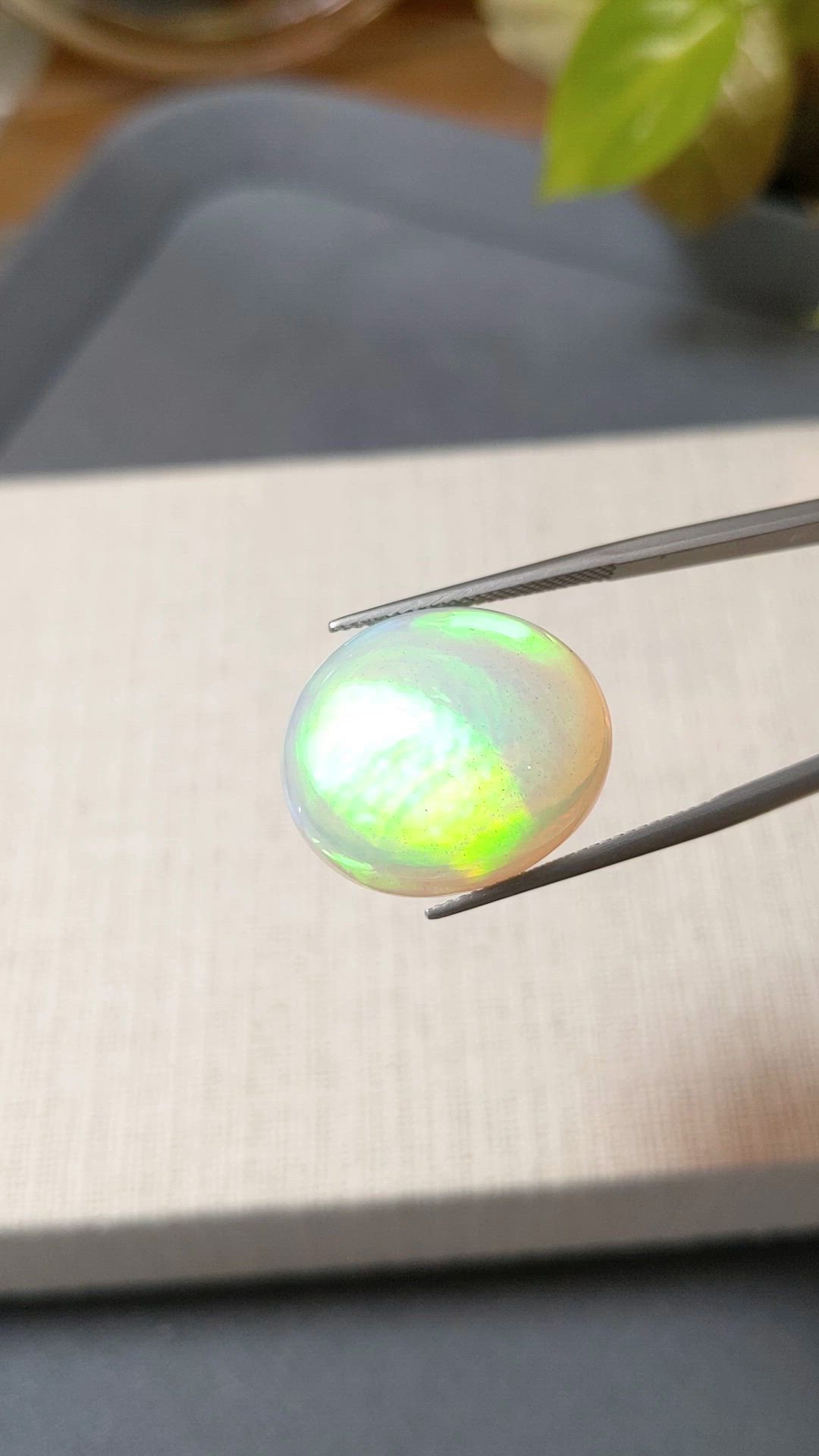 22.32 Ct. Multi Color Cabochon White Opal from Ethiopia Size Video
