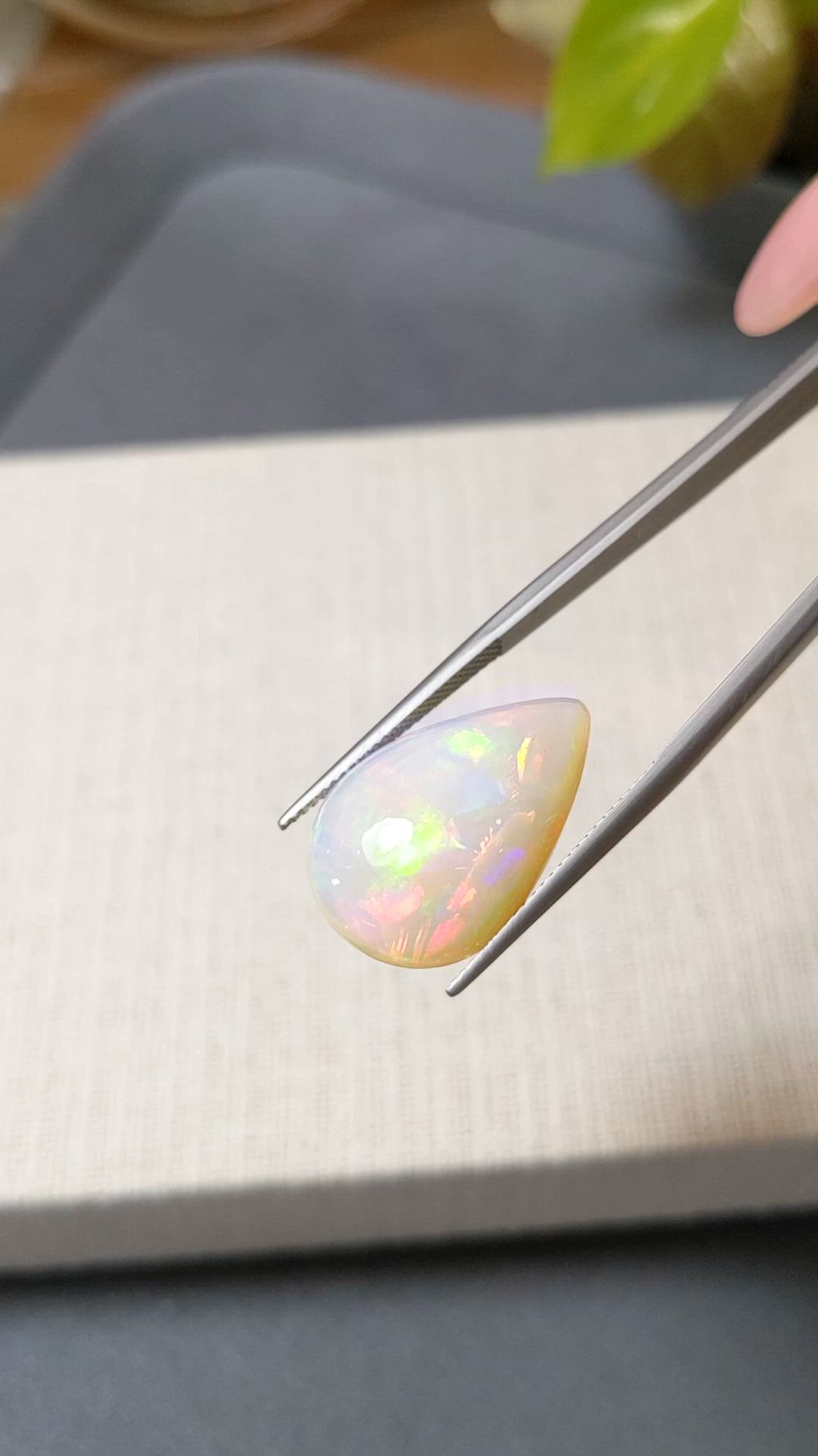 12.76 Ct. Multi Color Cabochon White Opal from Ethiopia Size Video