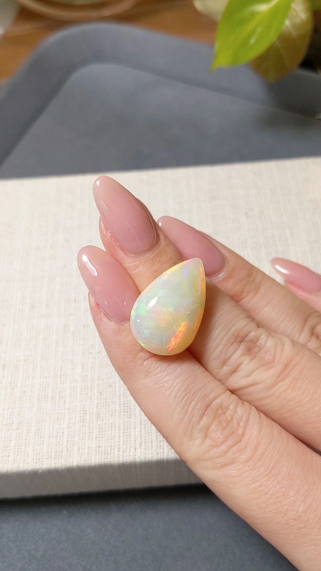 12.76 Ct. Multi Color Cabochon White Opal from Ethiopia Size Video