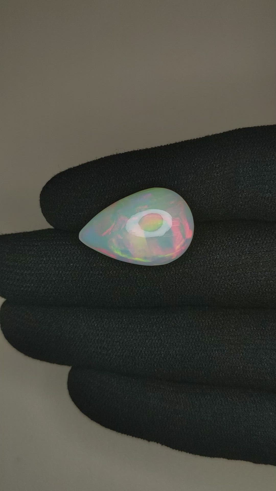 12.76 Ct. Multi Color Cabochon White Opal from Ethiopia Size Video