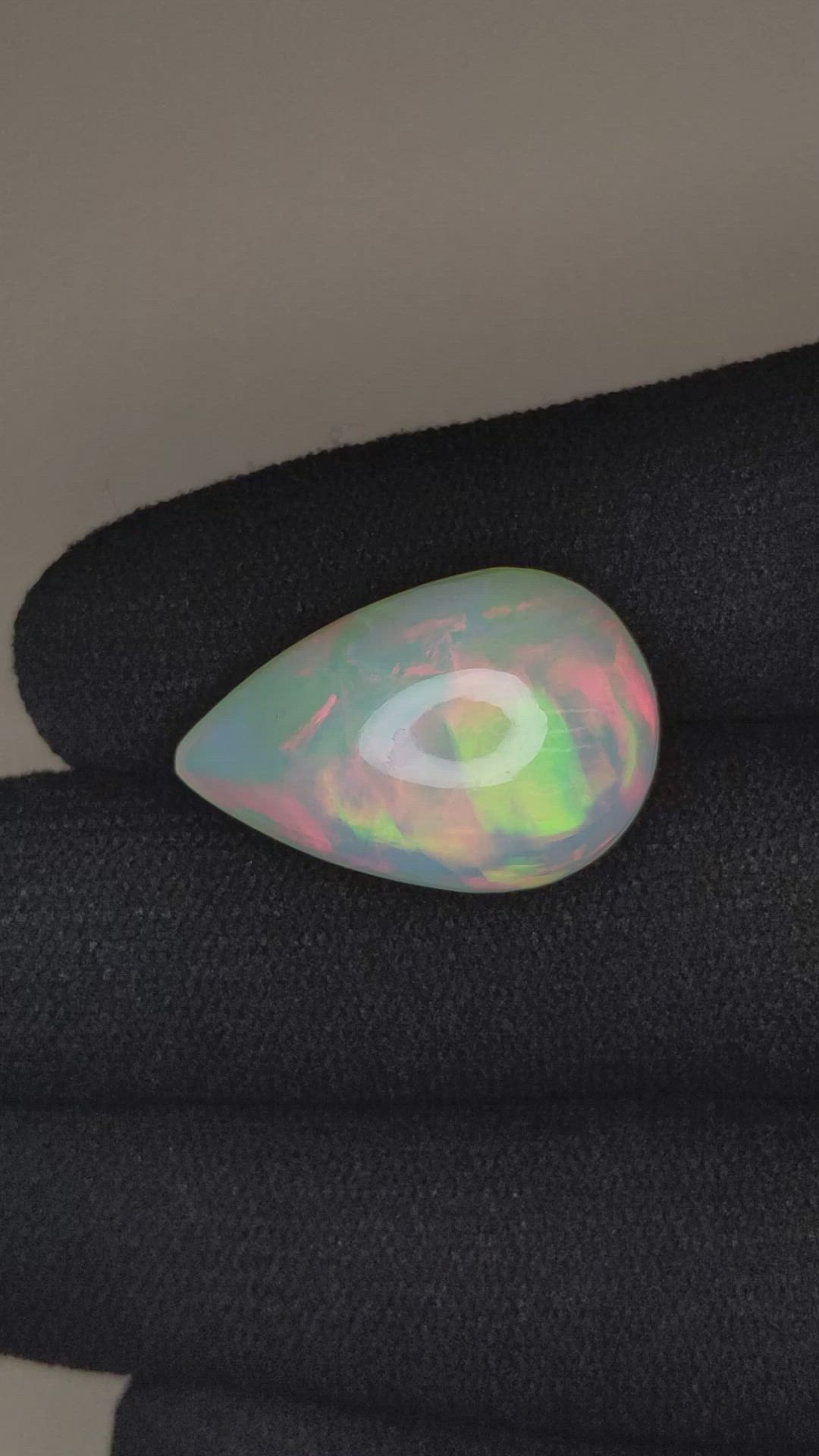12.76 Ct. Multi Color Cabochon White Opal from Ethiopia Size Video