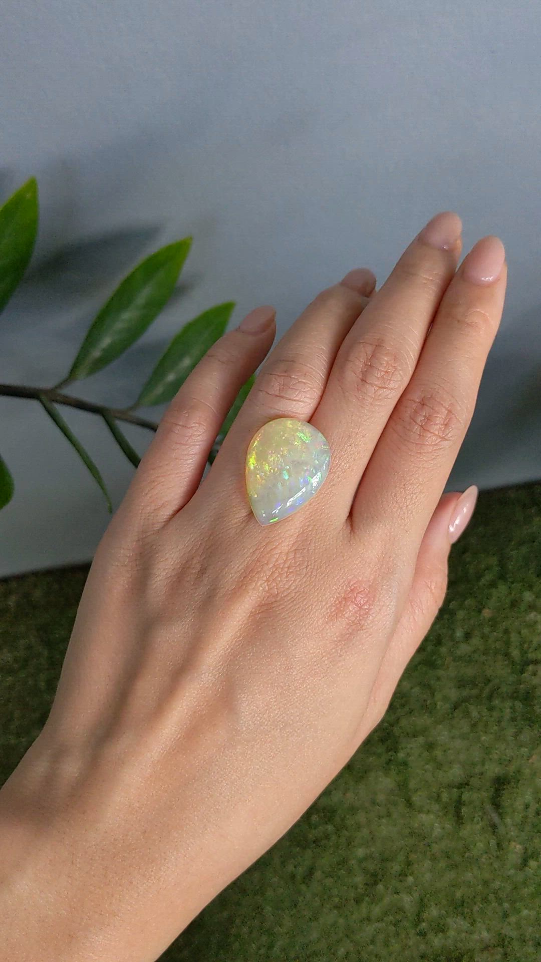 11.12 Ct. Multi Color Cabochon White Opal from Ethiopia Size Video