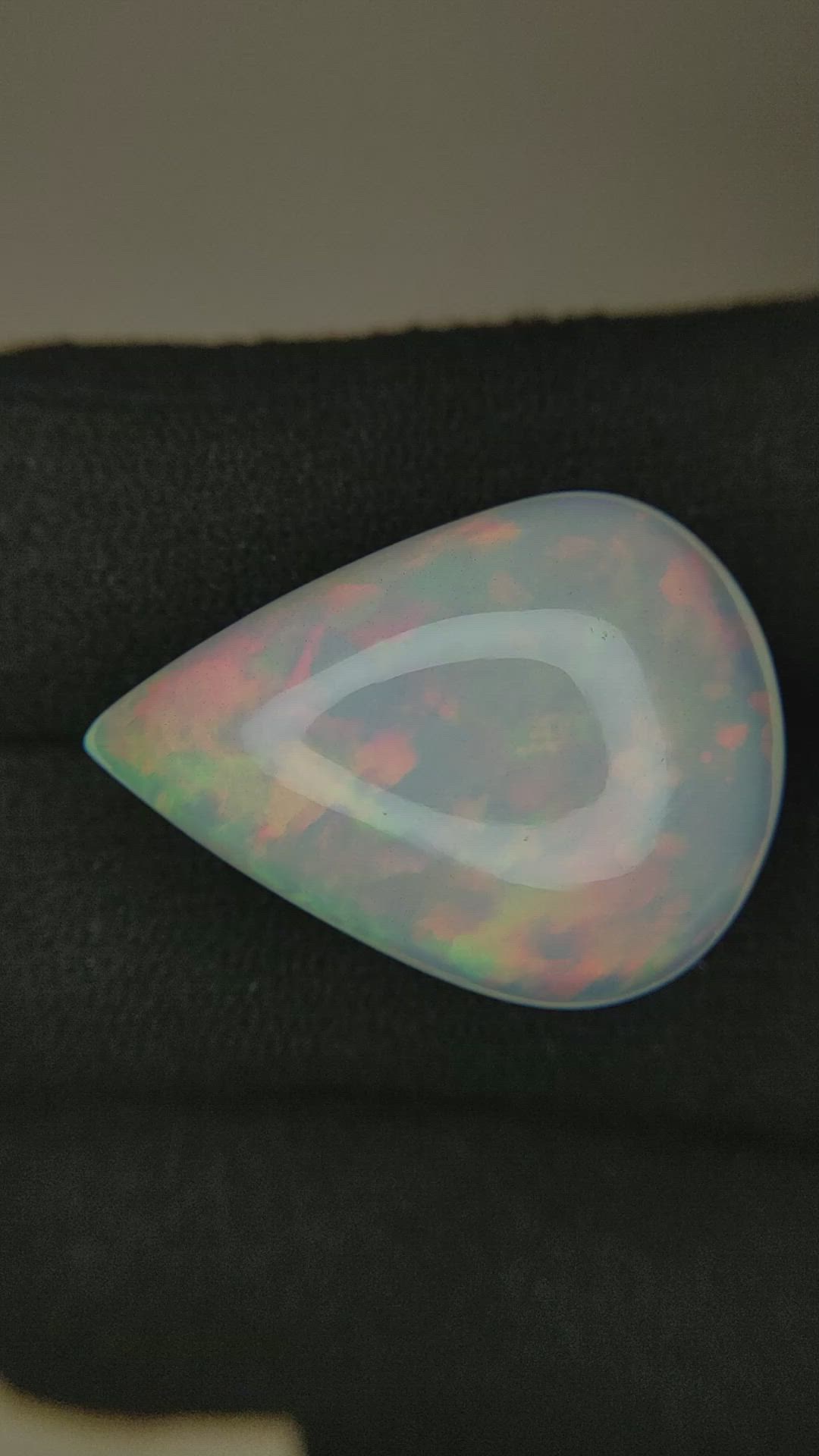 20.95 Ct. Multi Color Cabochon White Opal from Ethiopia Size Video