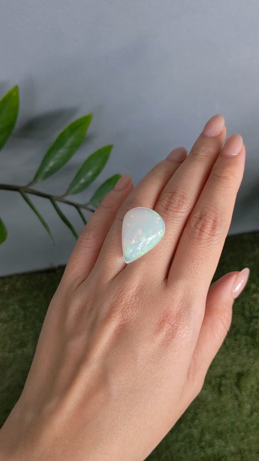 20.95 Ct. Multi Color Cabochon White Opal from Ethiopia Size Video