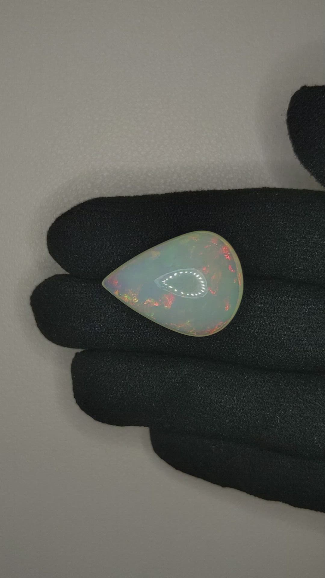 20.95 Ct. Multi Color Cabochon White Opal from Ethiopia Size Video