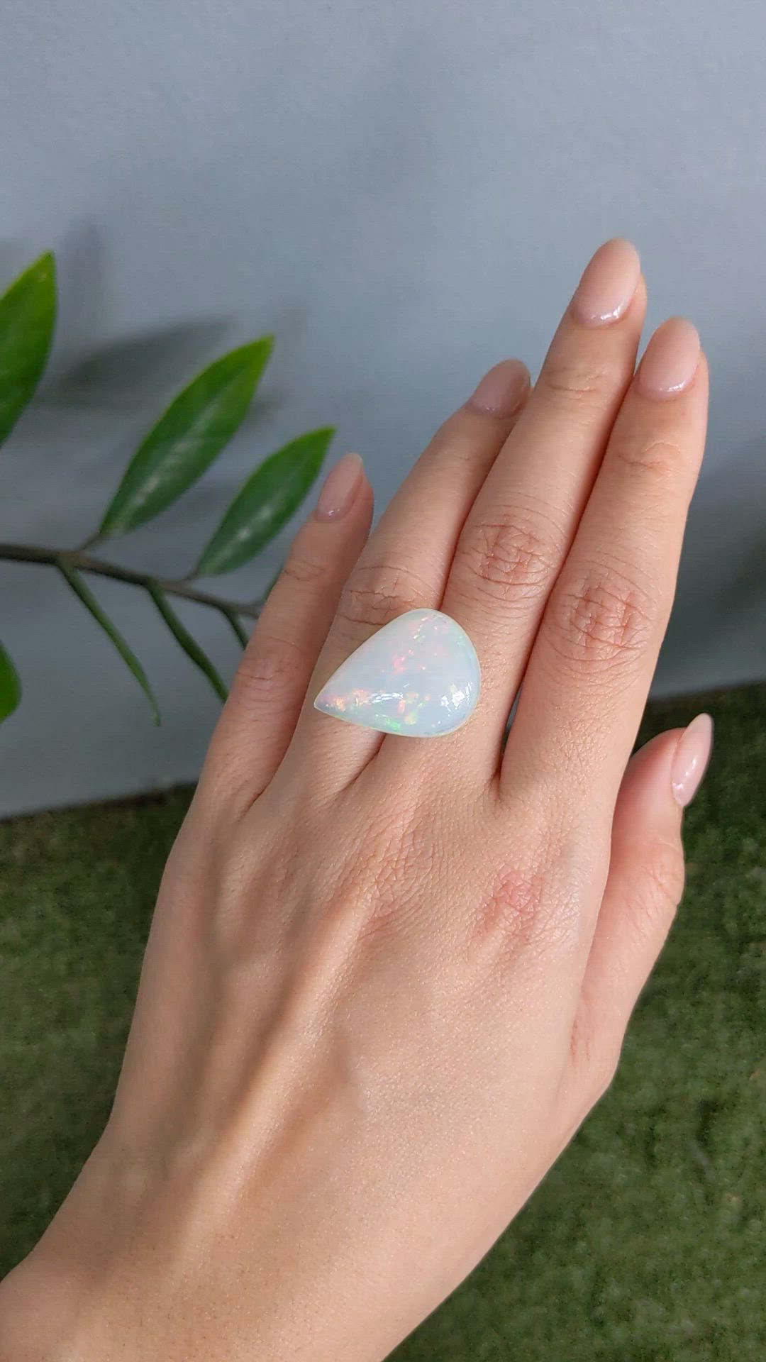 20.95 Ct. Multi Color Cabochon White Opal from Ethiopia Size Video