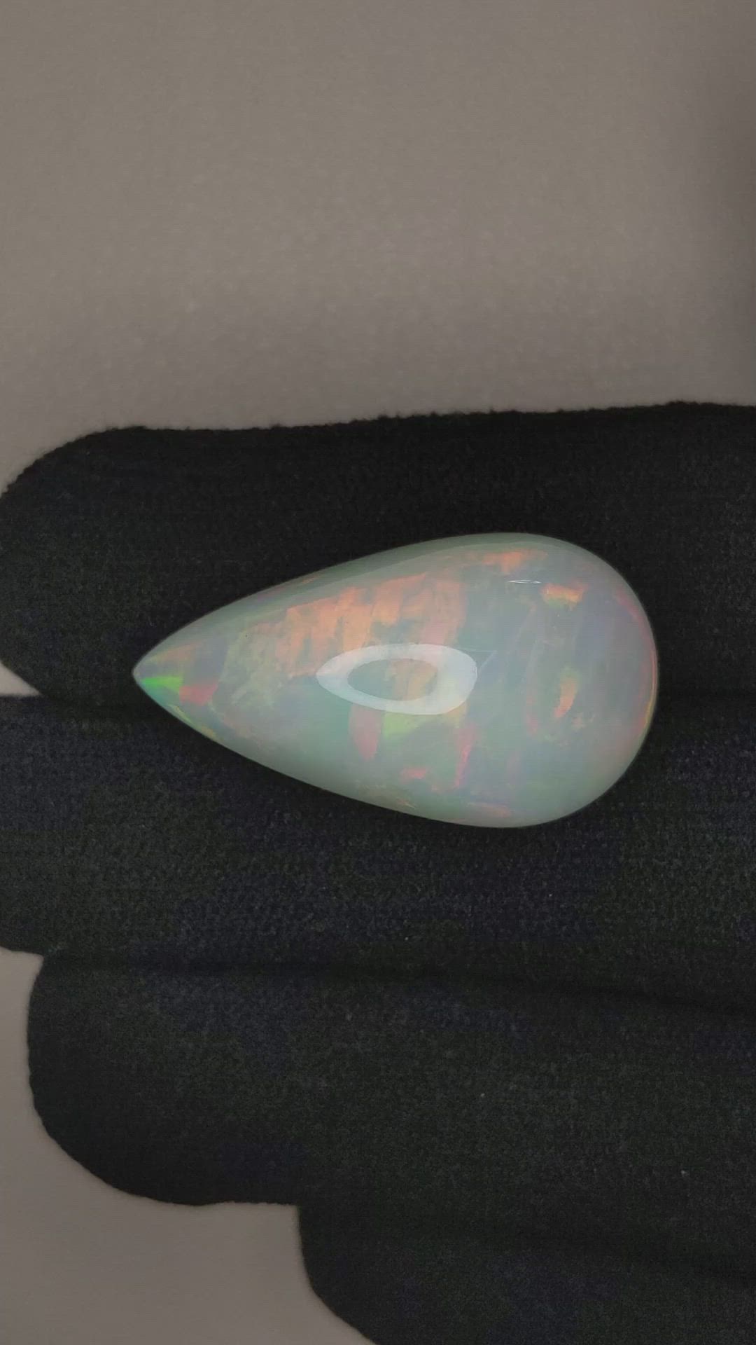 17.75 Ct. Multi Color Cabochon White Opal from Ethiopia Size Video