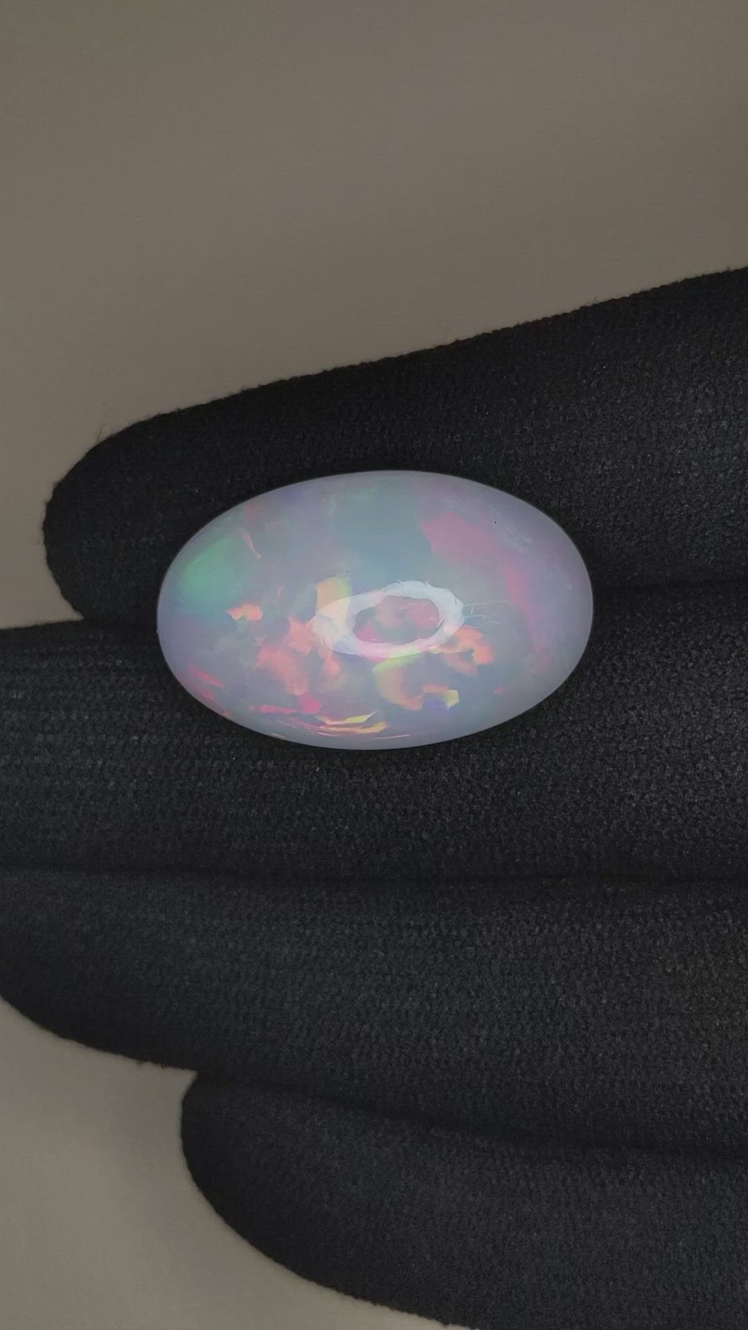 16.69 Ct. Multi Color Cabochon White Opal from Ethiopia Size Video