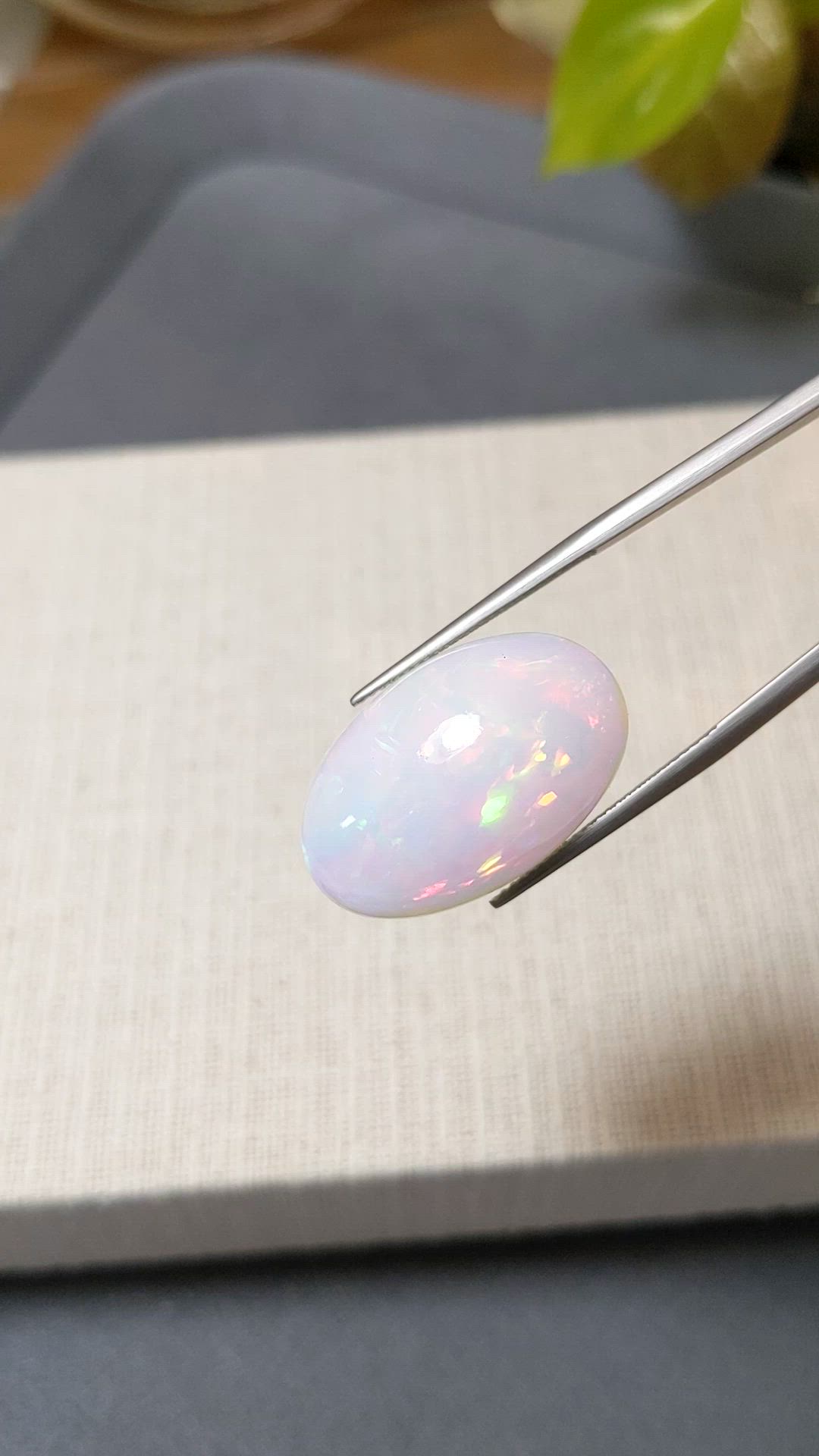 16.69 Ct. Multi Color Cabochon White Opal from Ethiopia Size Video