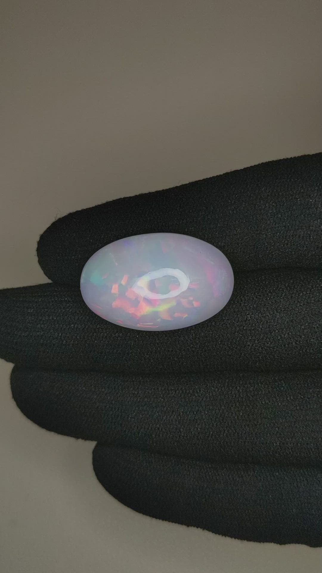 16.69 Ct. Multi Color Cabochon White Opal from Ethiopia Size Video