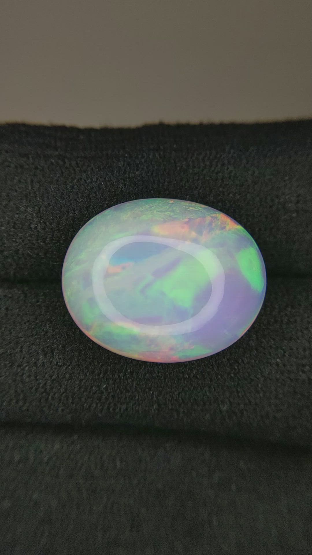 10.05 Ct. Multi Color Cabochon White Opal from Ethiopia Size Video