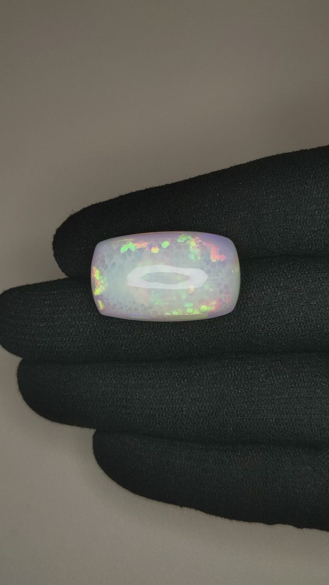 21.52 Ct. Multi Color Cabochon White Opal from Ethiopia Size Video