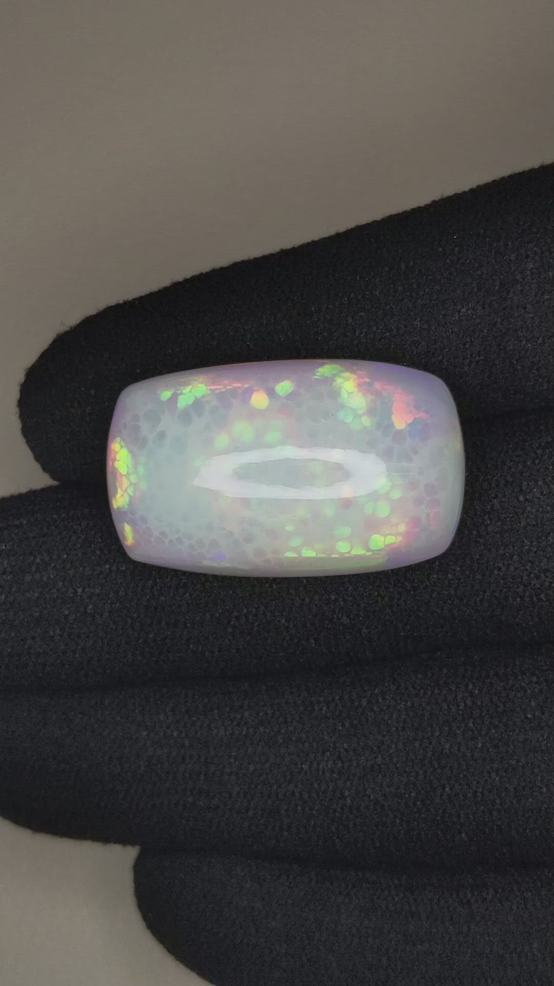 21.52 Ct. Multi Color Cabochon White Opal from Ethiopia Size Video