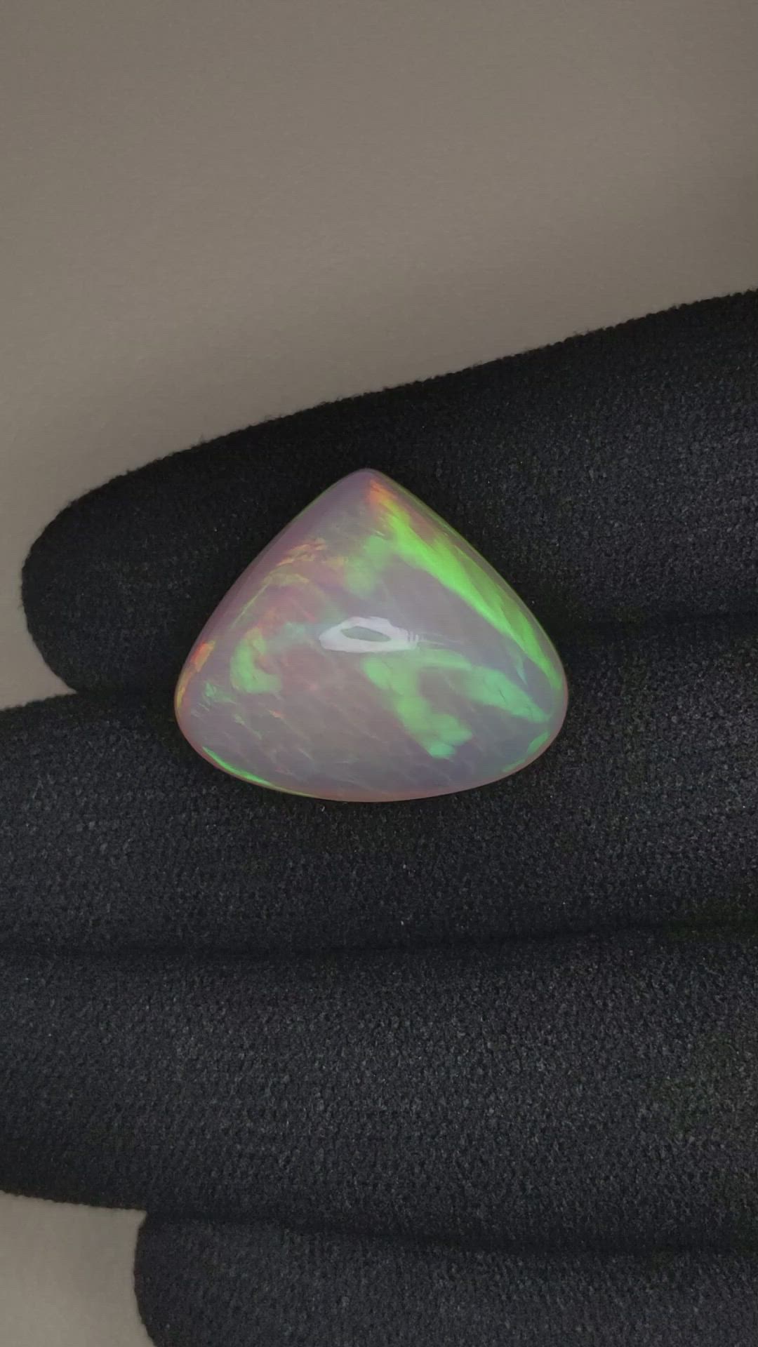 18.51 Ct. Multi Color Cabochon White Opal from Ethiopia Size Video