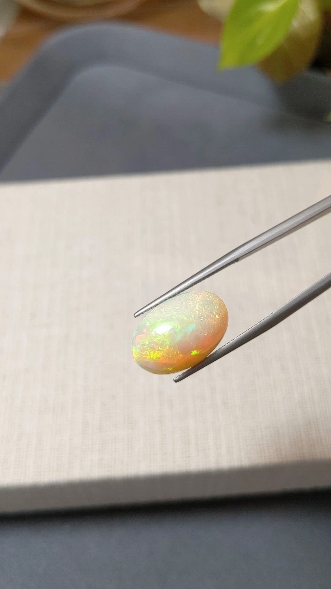 7.02 Ct. Multi Color Cabochon White Opal from Ethiopia Size Video