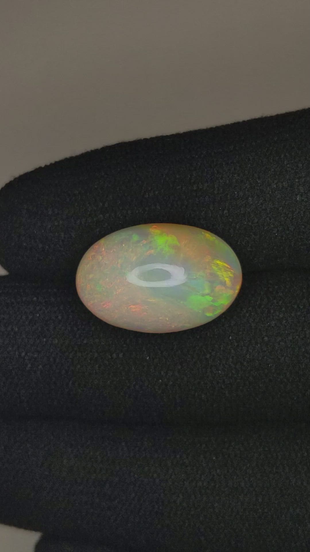 7.02 Ct. Multi Color Cabochon White Opal from Ethiopia Size Video